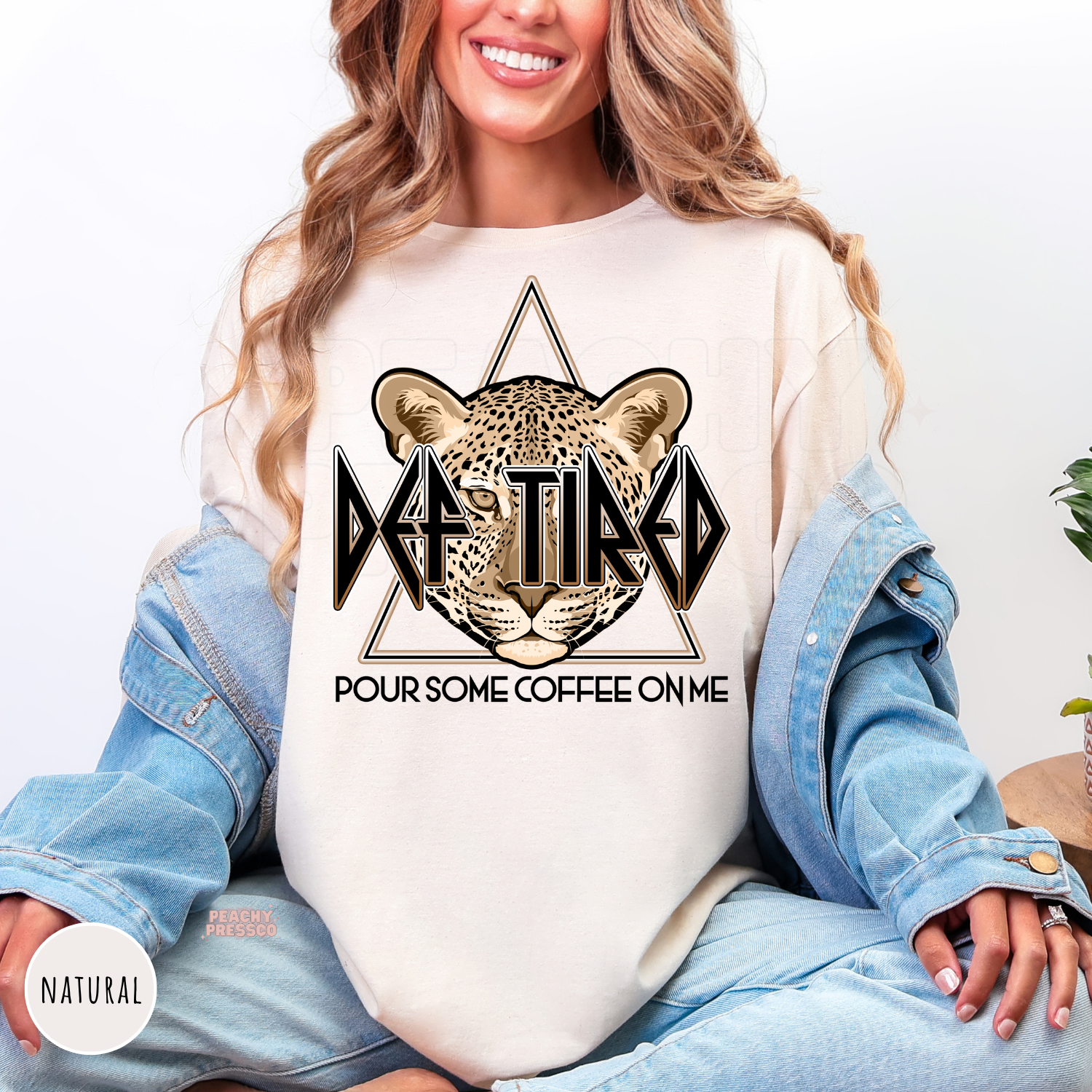 Def Tired Pour Some Coffee On Me graphic tee in Natural featuring a leopard face and funny caffeine-inspired retro design.
