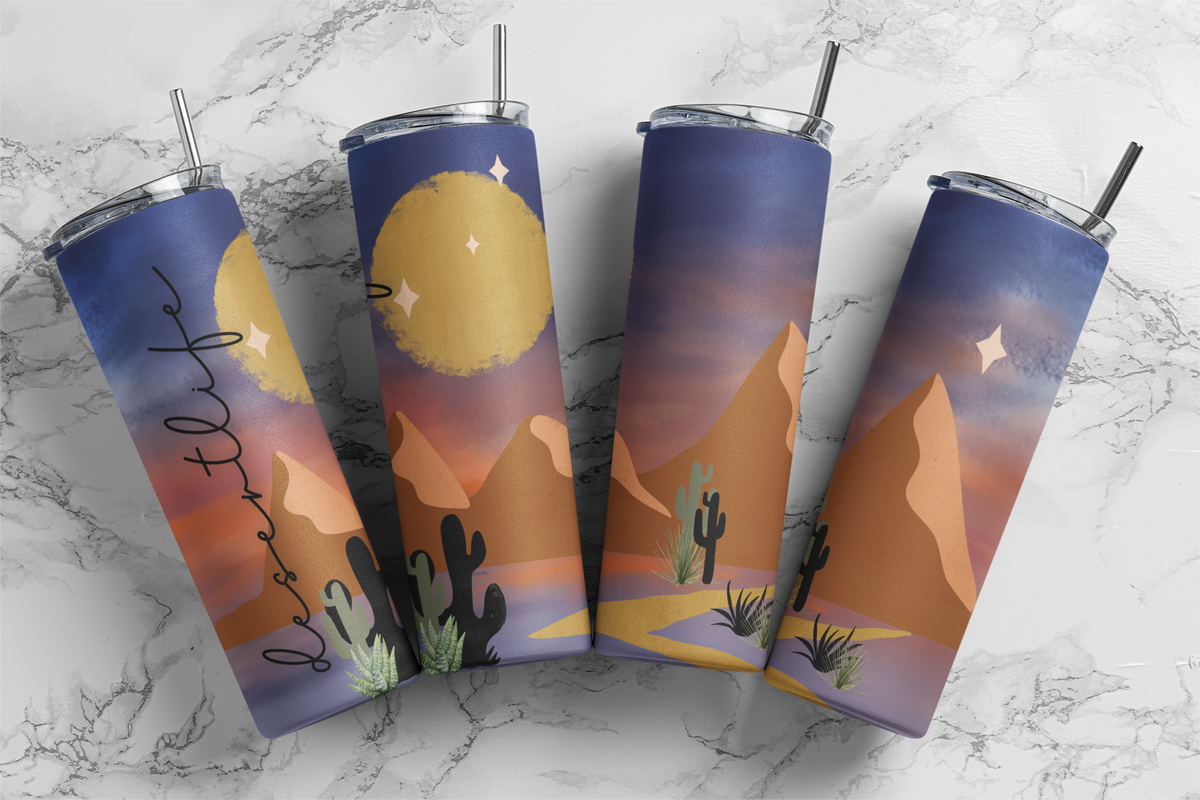 20oz skinny tumbler featuring a colorful desert sunset with cacti, mountains, moon, and custom name design.