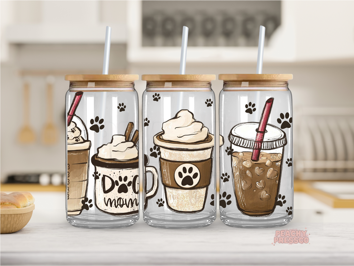 16oz glass cup featuring coffee drinks, paw prints, and "Dog Mom" design with bamboo lid and reusable straw.