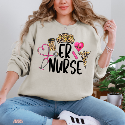 Sand coloured ER Nurse sweatshirt featuring leopard print coffee cup and nurse hat, pink stethoscope and heartbeat heart design.