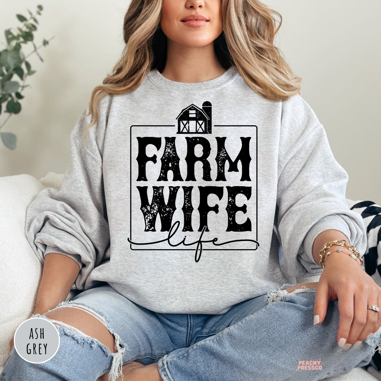 Ash grey Farm Wife Life sweatshirt featuring a distressed farmhouse graphic in a rustic western farmhouse style.