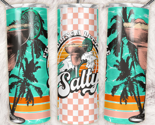 20oz stainless steel tumbler featuring a retro margarita cocktail, palm trees, beach waves, and "Feeling Salty" lettering in vibrant tropical colors. Great for beach lovers and margarita fans.