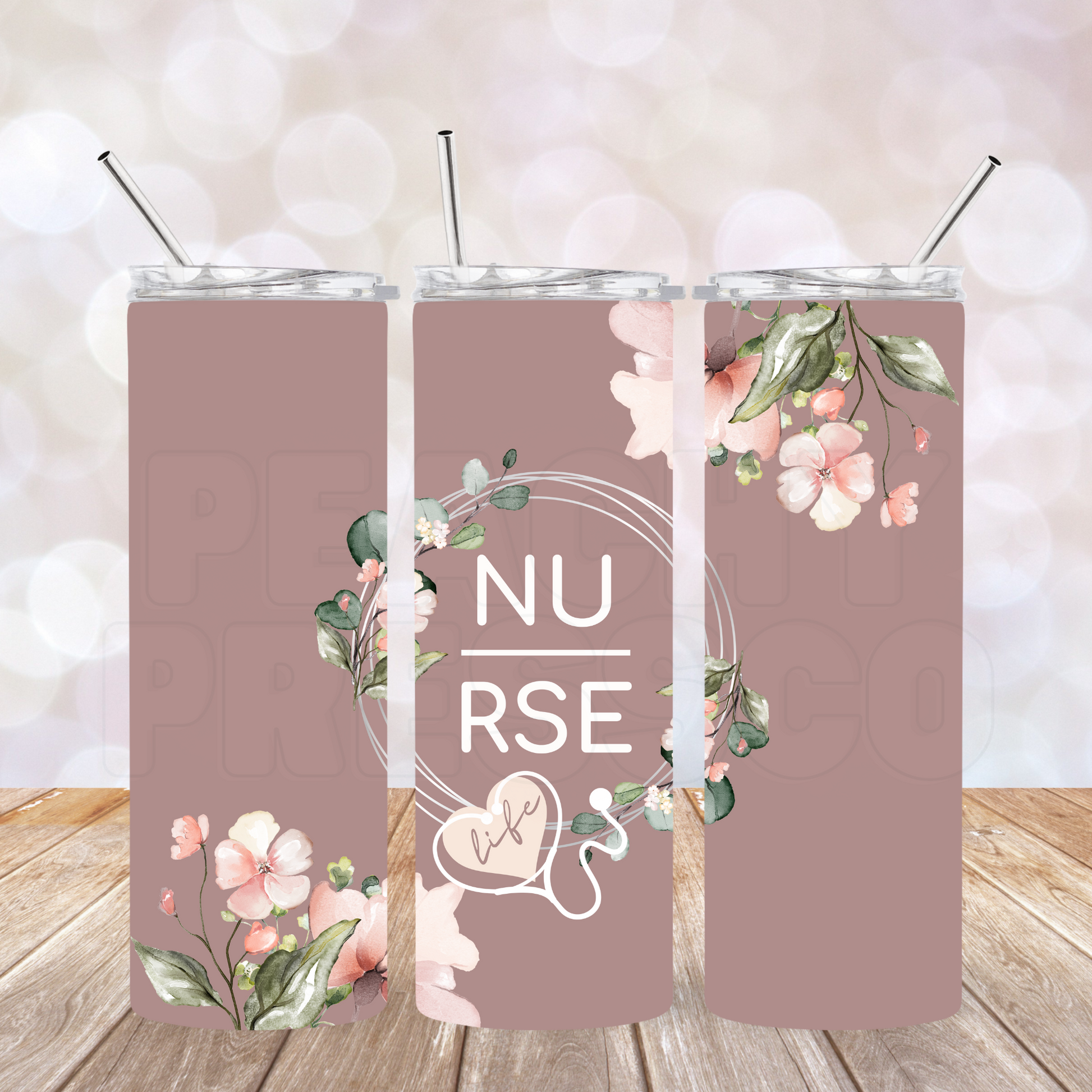 Floral nurse life skinny tumbler with blush flowers, eucalyptus leaves, stethoscope heart, and elegant minimalist nursing design.