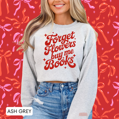 Ash grey crewneck sweatshirt featuring the "Forget Flowers Buy Me Books" quote in vintage red typography for Valentine's Day.
