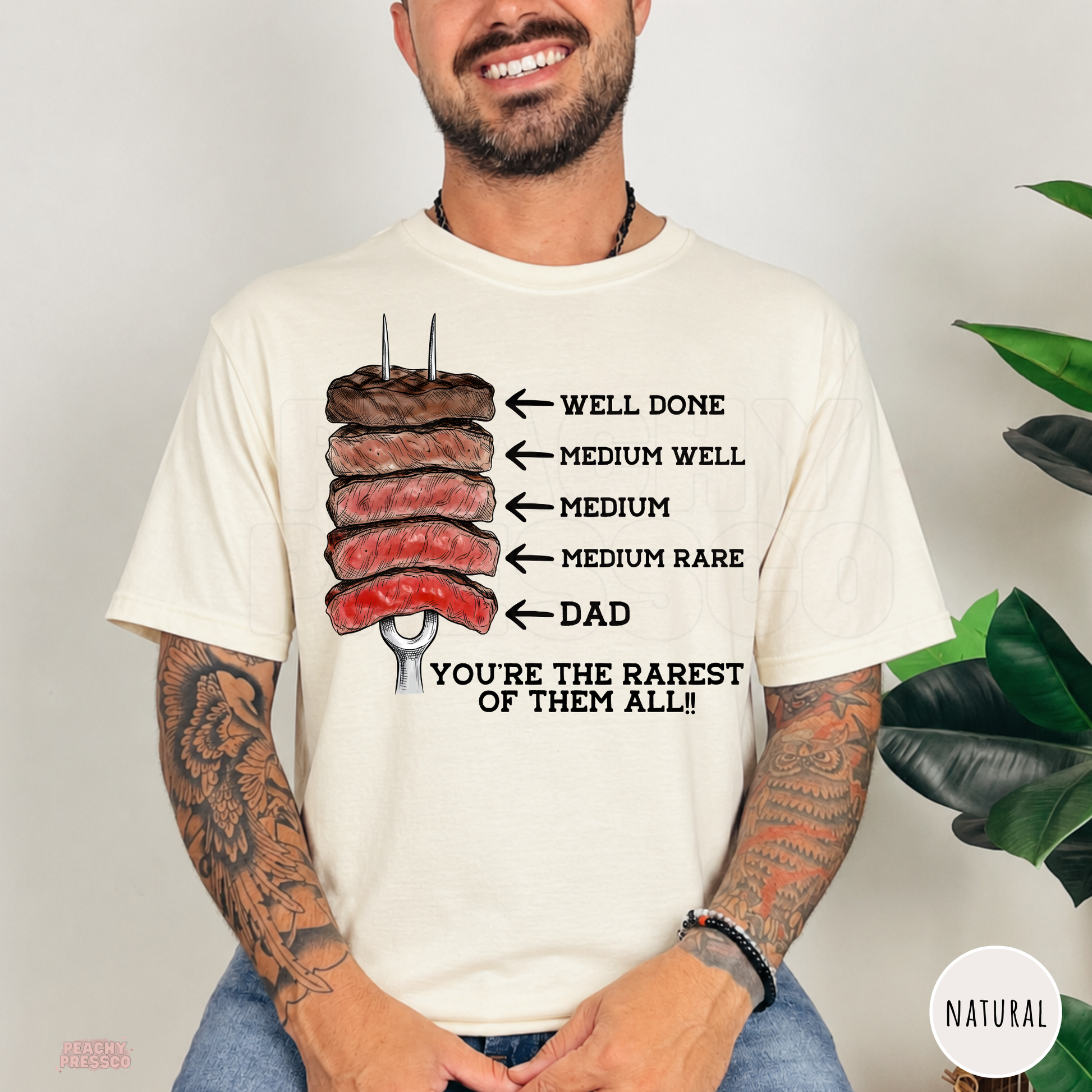 Natural t-shirt displaying a humorous steak doneness chart graphic with Dad as the rarest for grilling dads.