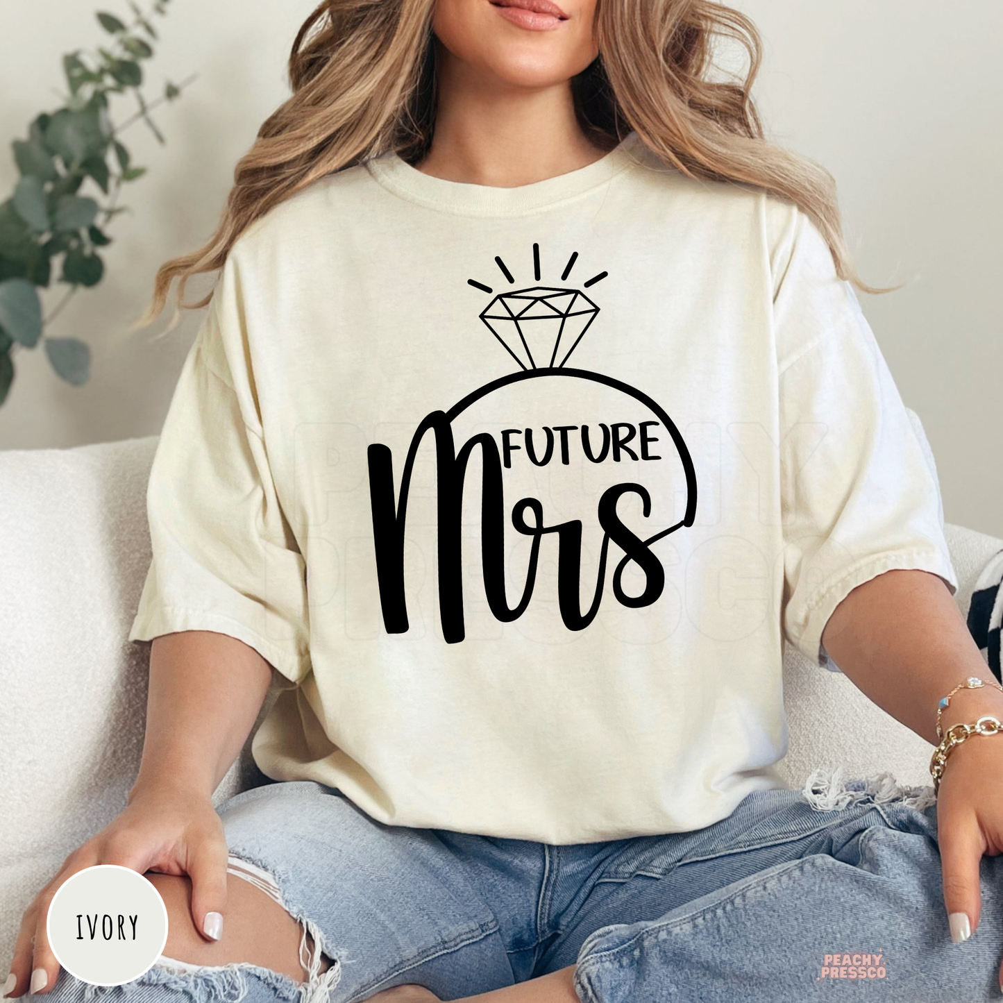 Ivory Comfort Colors t-shirt with a black "Future Mrs" graphic and diamond ring illustration, perfect for engaged women, bridal events, engagement photos, bachelorette weekends, and wedding gift ideas.