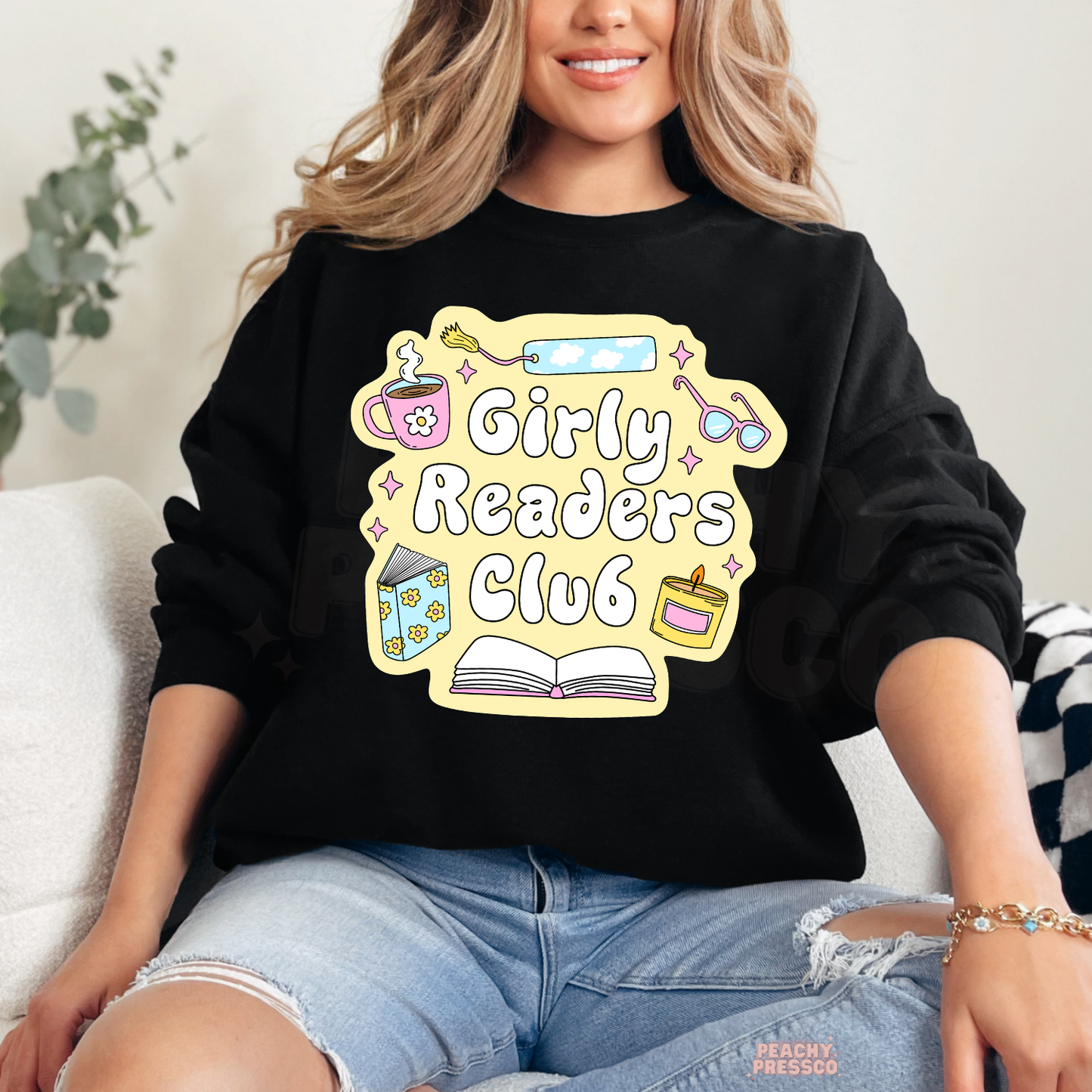 Black crewneck sweatshirt with Girly Readers Club graphic, perfect for readers, book clubs, librarians, and cozy reading days.