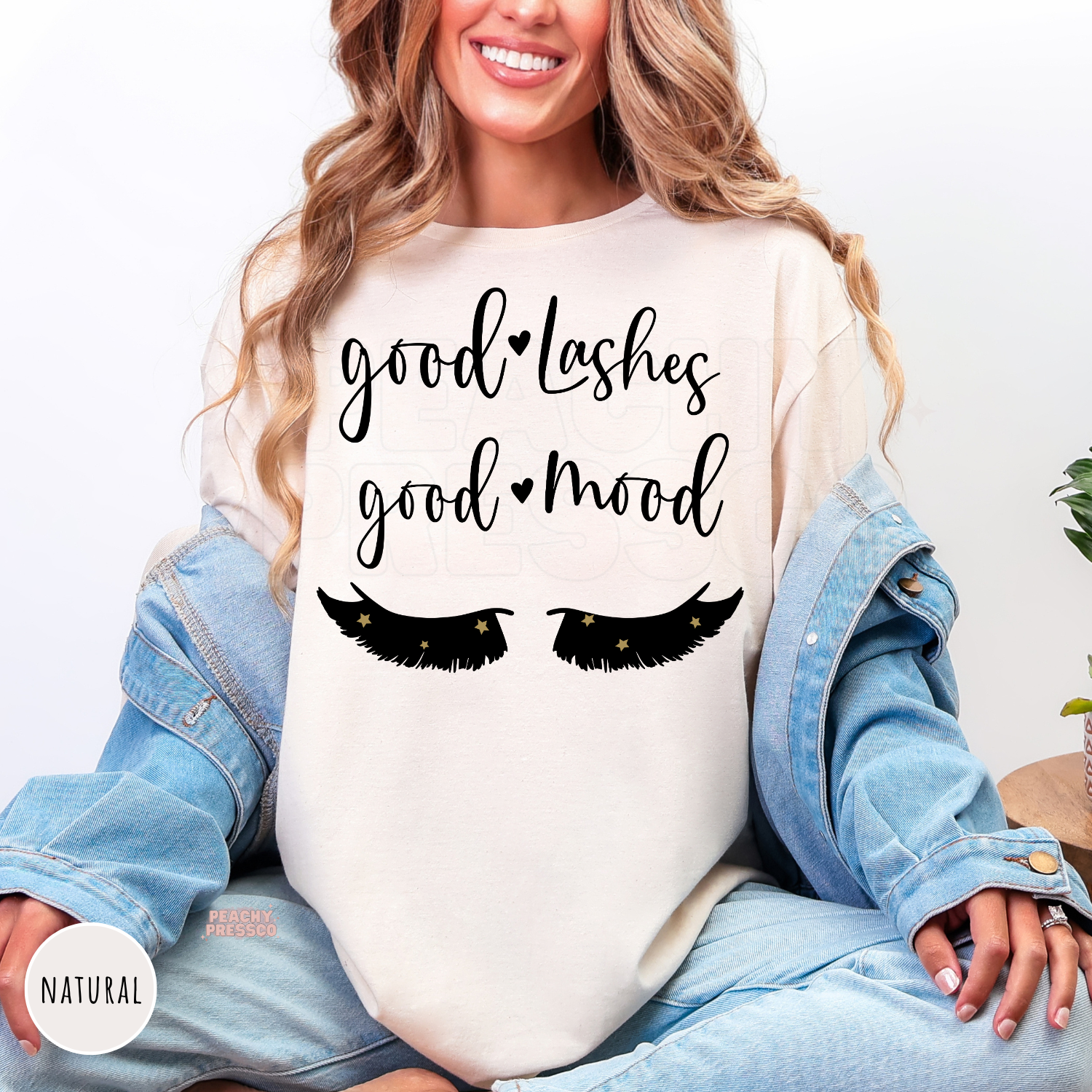 Natural shirt featuring the phrase "Good Lashes Good Mood" with eyelash graphics, perfect for lash artists, lash technicians, estheticians, and beauty professionals.