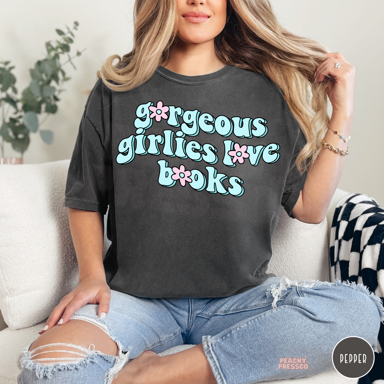 Pepper Comfort Colors tee featuring the "Gorgeous Girlies Love Books" retro graphic in pastel blue and pink for readers and book club members.