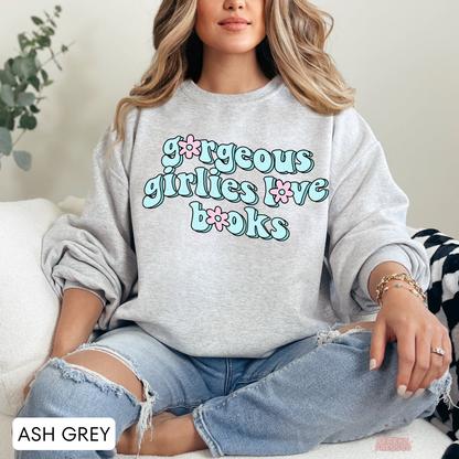 Ash Grey crewneck sweatshirt featuring the "Gorgeous Girlies Love Books" retro graphic in pastel blue and pink typography.