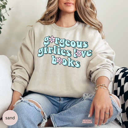 Sand crewneck sweatshirt featuring the "Gorgeous Girlies Love Books" graphic with retro pastel lettering for book lovers.
