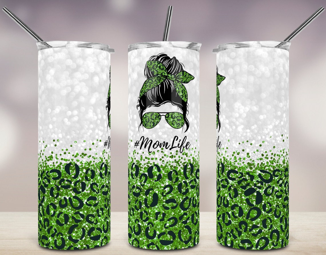 20oz skinny tumbler featuring green glitter leopard print with a Mom Life messy bun design, green sunglasses, and coordinating headband.