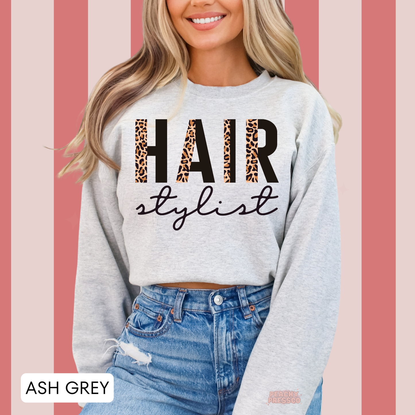 Ash grey crewneck sweatshirt featuring a leopard print Hair Stylist design, ideal for hairstylists, salon teams, hairdressers, and cosmetology professionals.