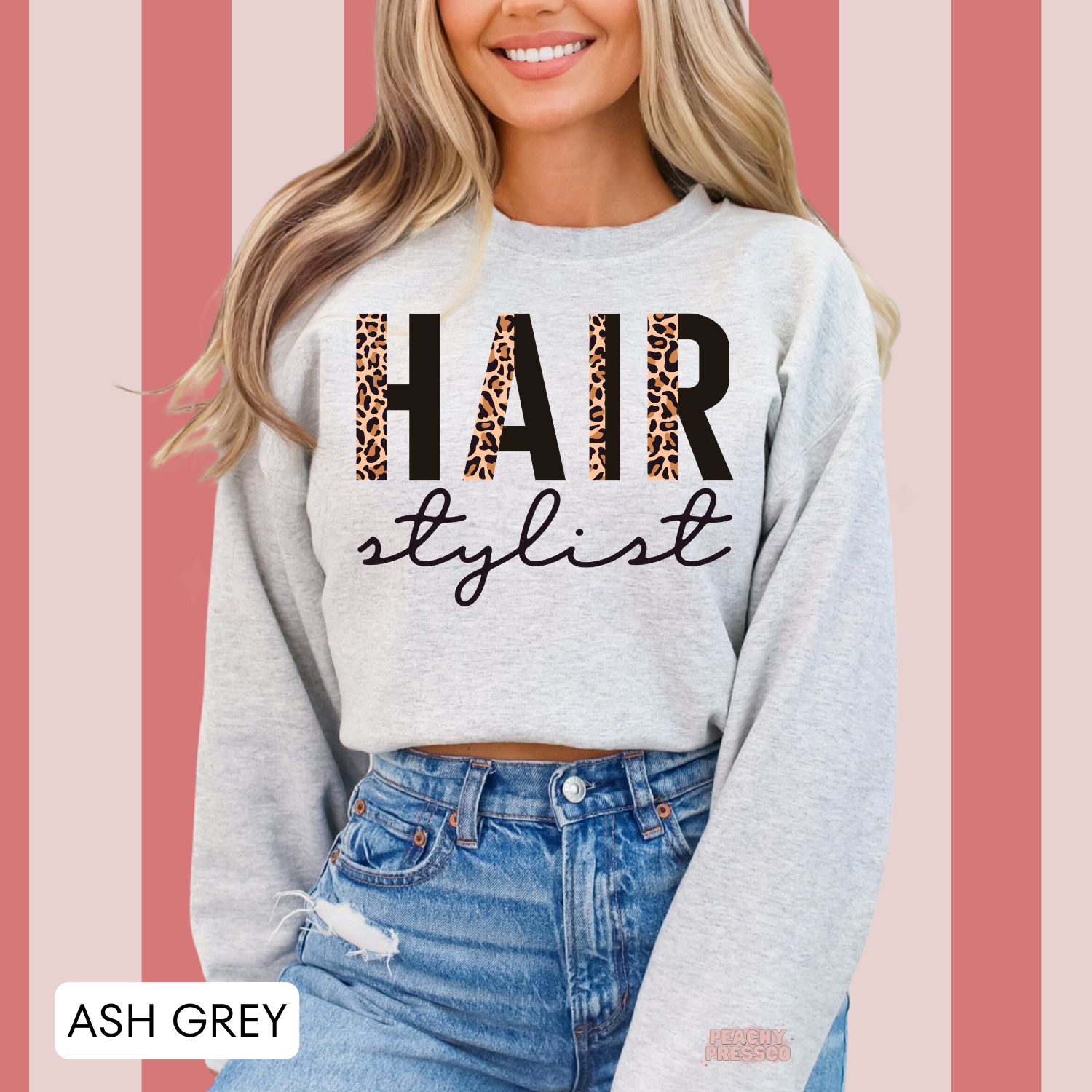 Ash grey crewneck sweatshirt featuring a leopard print Hair Stylist design, ideal for hairstylists, salon teams, hairdressers, and cosmetology professionals.