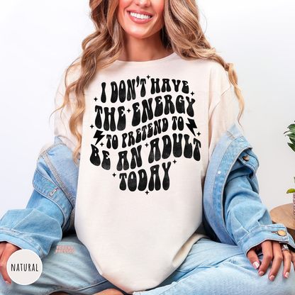 Natural shirt with a funny adulting quote graphic reading "I Don't Have the Energy to Pretend to Be an Adult Today."