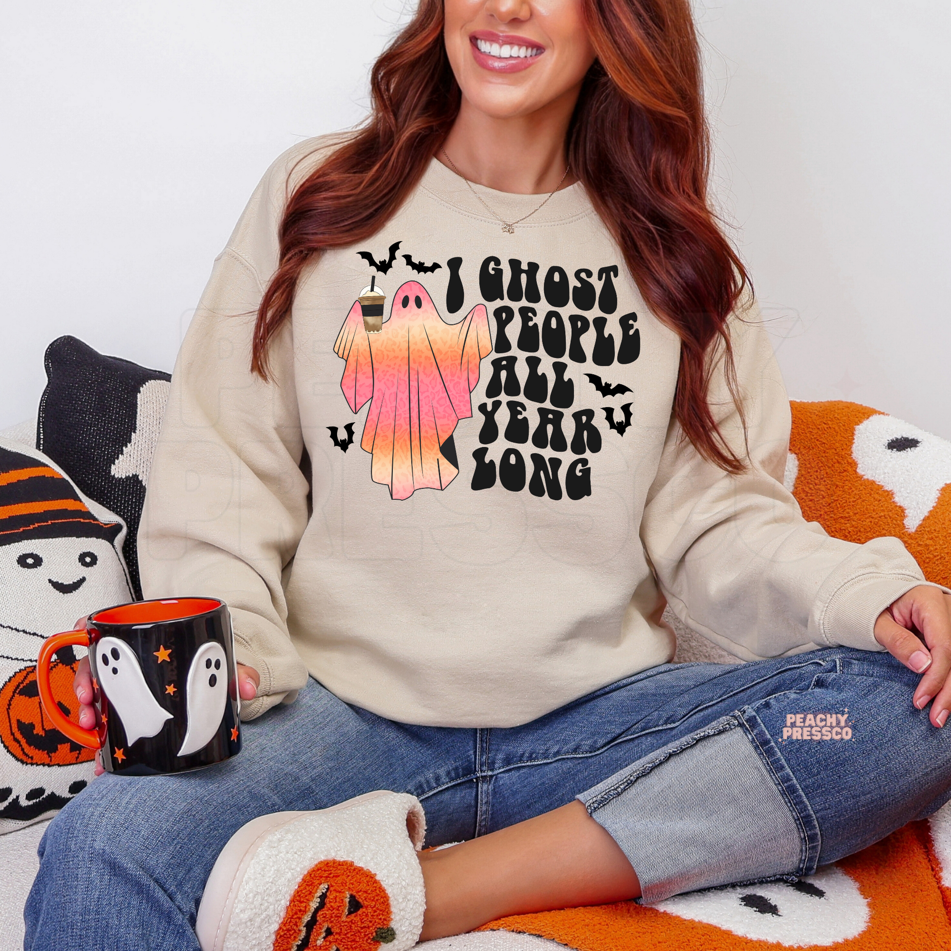 Sand Halloween sweatshirt with I Ghost People All Year Long pink coffee ghost and bat graphic