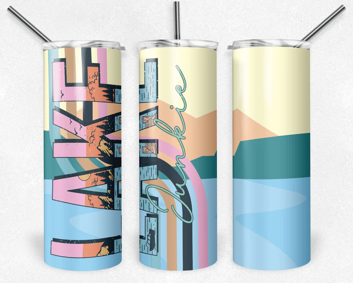 20oz stainless steel tumbler featuring a retro abstract lake landscape with custom "Lake Junkie" script, pastel mountains, rainbow accents, and modern outdoor artwork. Perfect for lake lovers, boating, and camping.