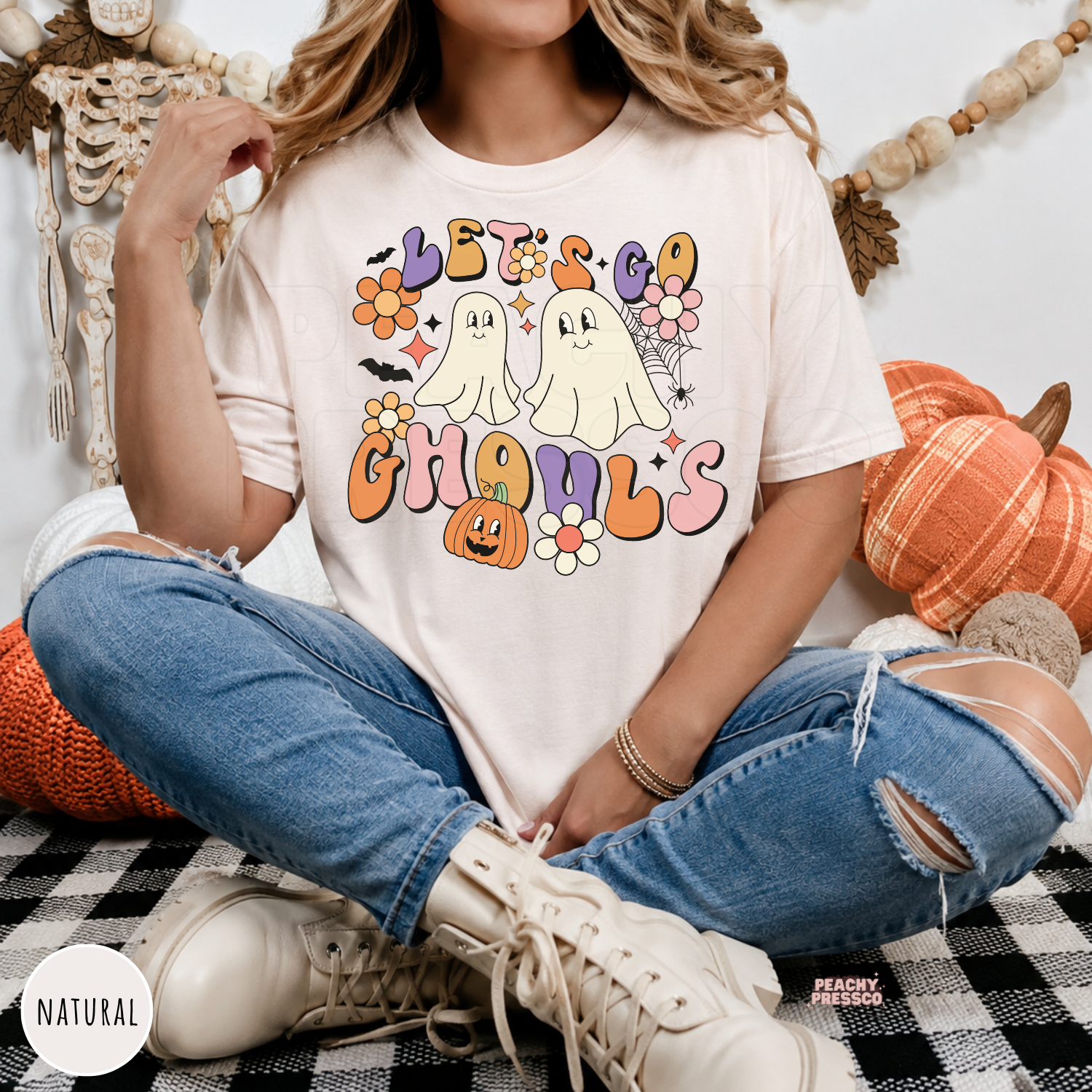 Natural Let’s Go Ghouls Halloween T-shirt featuring cute ghosts, pumpkin, bats and colorful retro floral graphics
