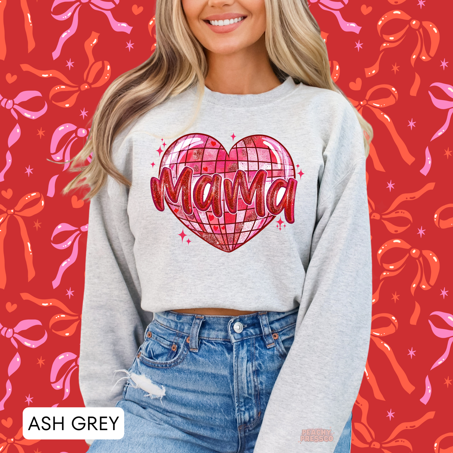 Ash grey sweatshirt featuring a pink glitter disco heart with Mama text, creating a fun retro Valentine's Day look.
