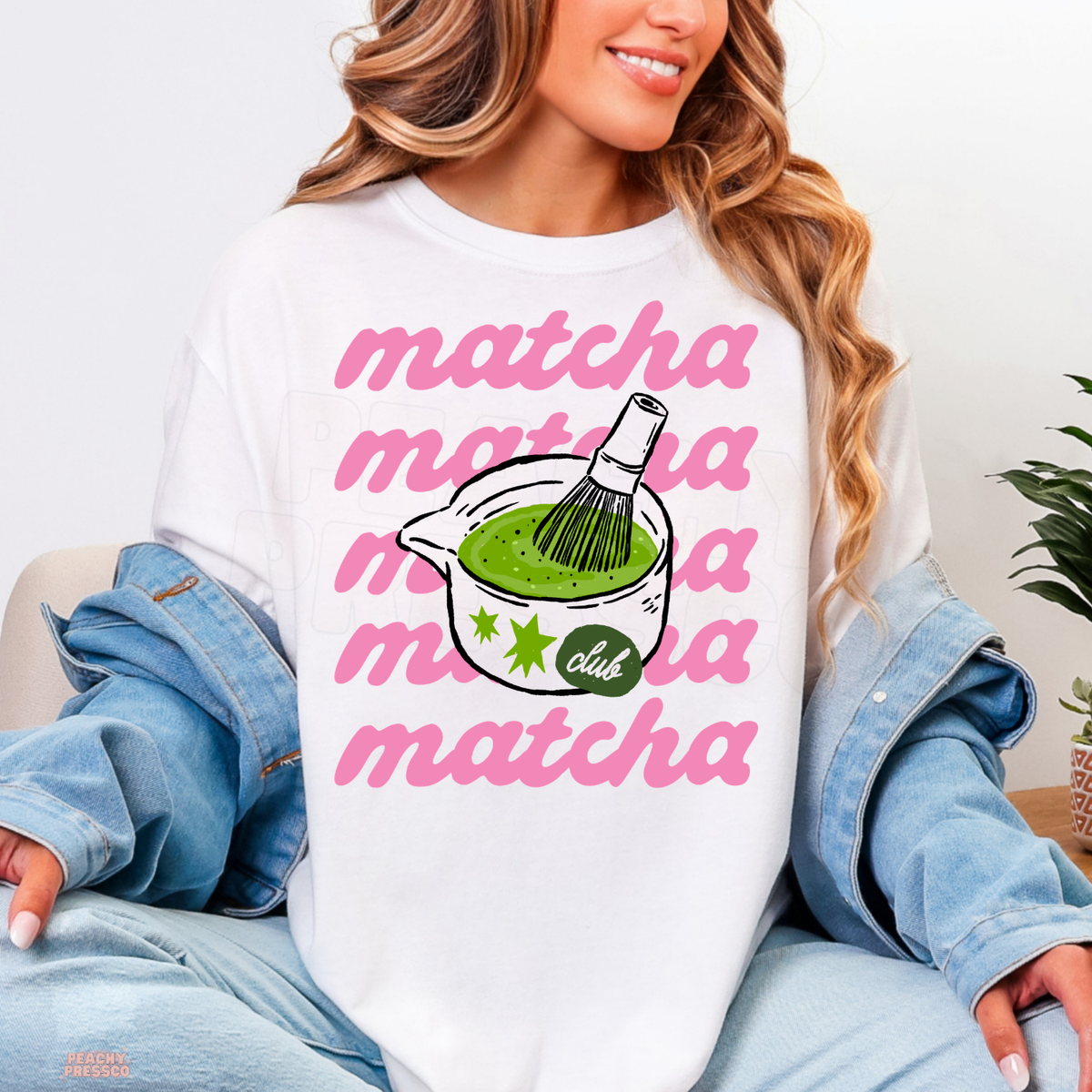 White Matcha Club shirt featuring pink matcha typography, a hand-drawn matcha bowl with bamboo whisk, green tea, and cute star details.