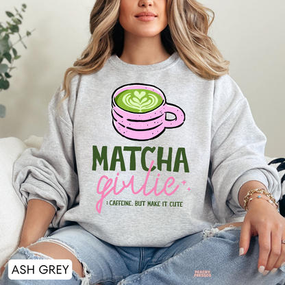 Ash grey Matcha Girlie sweatshirt featuring a pink matcha latte mug, green heart latte art, pink script lettering, and cute caffeine quote.