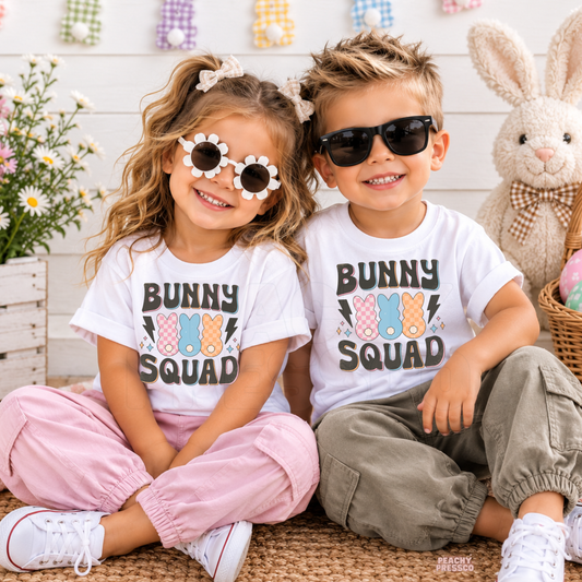 Matching Bunny Squad Easter shirts for toddler boy and girl featuring colorful retro bunny and spring-inspired design.