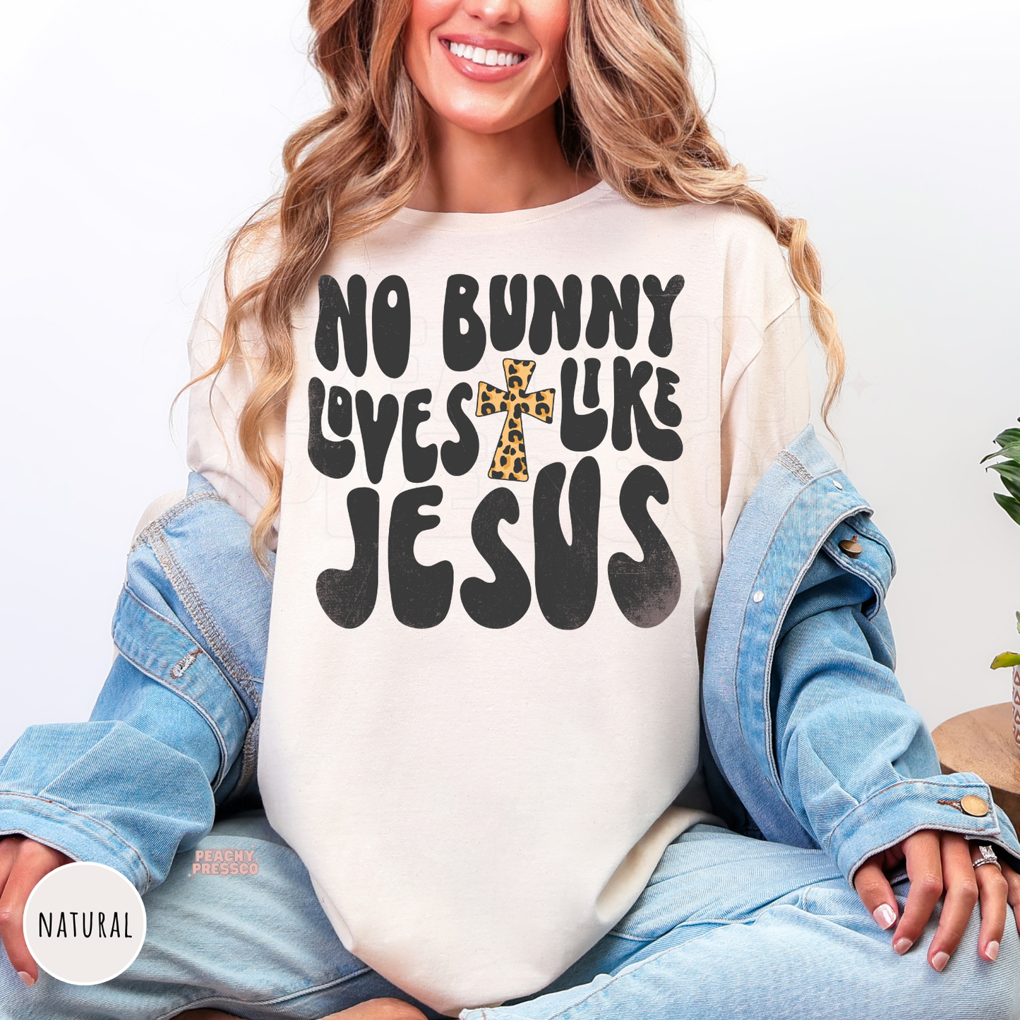 Natural shirt with a No Bunny Loves Like Jesus faith-inspired Easter design and leopard cross.