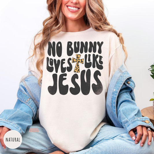 Natural shirt with a No Bunny Loves Like Jesus faith-inspired Easter design and leopard cross.