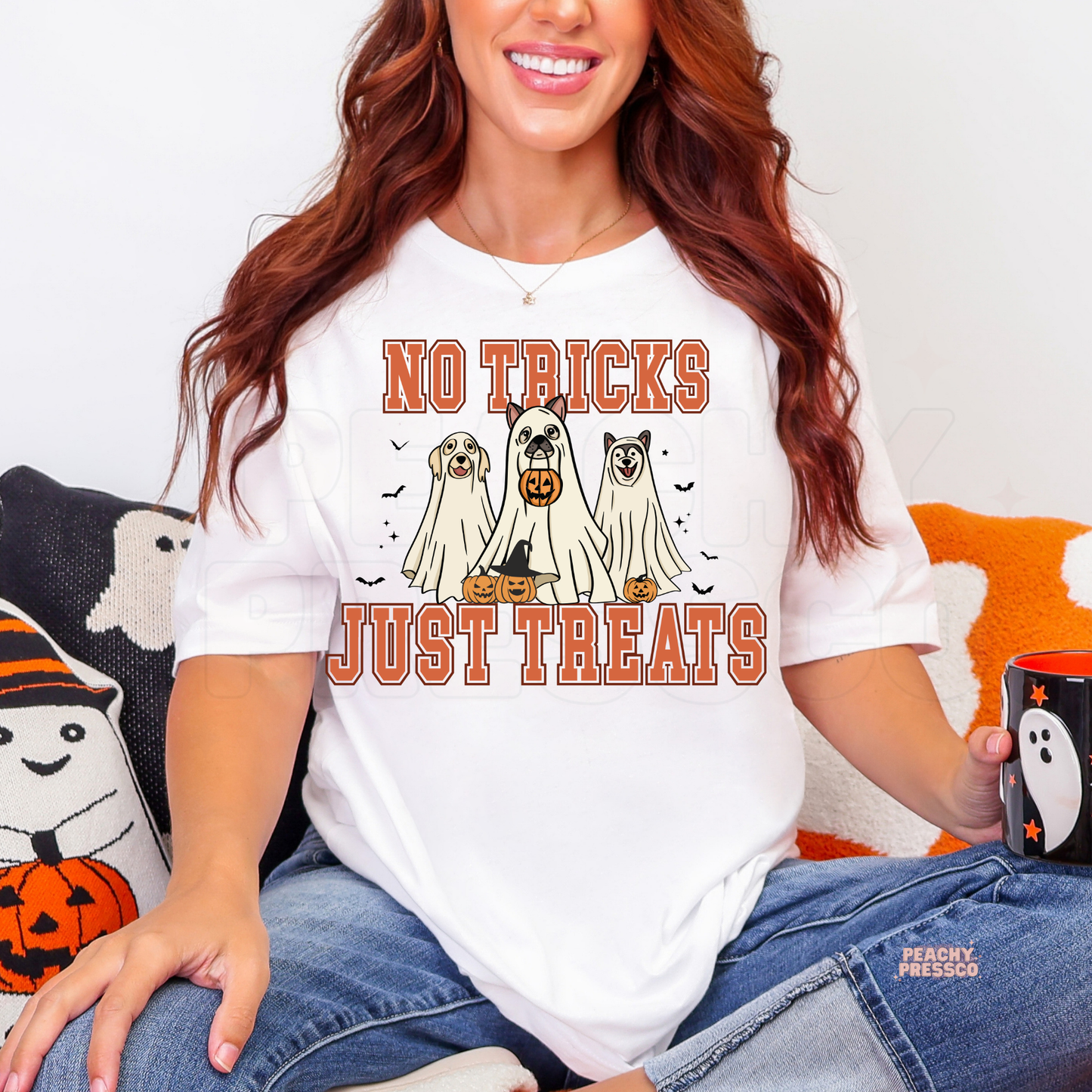 White No Tricks Just Treats Halloween dog graphic tee featuring three ghost dogs, pumpkins, bats and spooky details