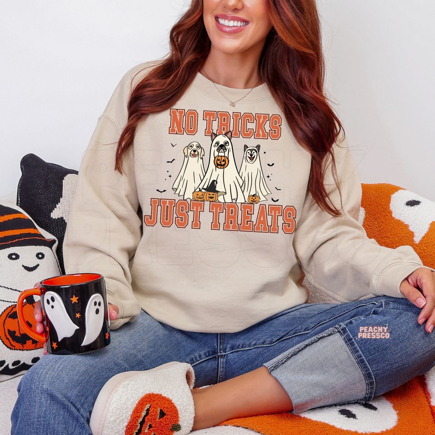 Sand No Tricks Just Treats Halloween sweatshirt featuring cute dogs dressed as ghosts with pumpkins and spooky bats