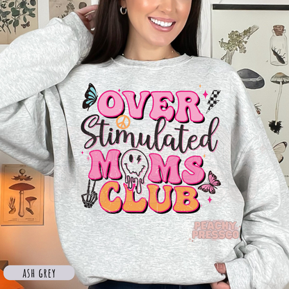 Ash Grey sweatshirt featuring a colorful "Over Stimulated Moms Club" graphic with retro lettering, butterflies, skeleton hand, and lightning bolt. Funny mom sweatshirt for busy moms.