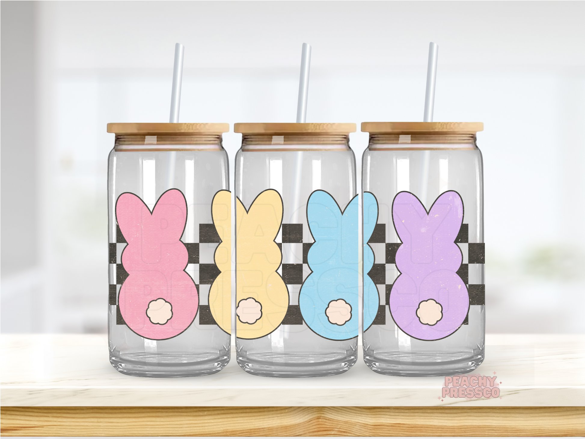 16oz glass cup featuring colorful pastel bunny in pink, yellow, blue, and purple with a farmhouse Easter aesthetic.