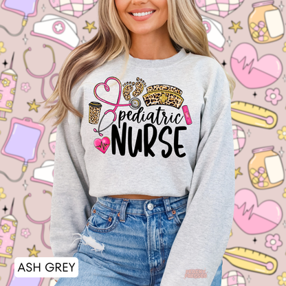 Ash grey pediatric nurse sweatshirt with leopard print baby footprints, pink stethoscope, leopard nurse hat and bold black Pediatric Nurse design.