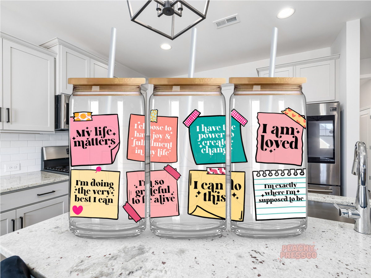 16oz glass cup featuring colorful sticky note affirmations for self-love, positivity, and daily motivation with bamboo lid and straw.