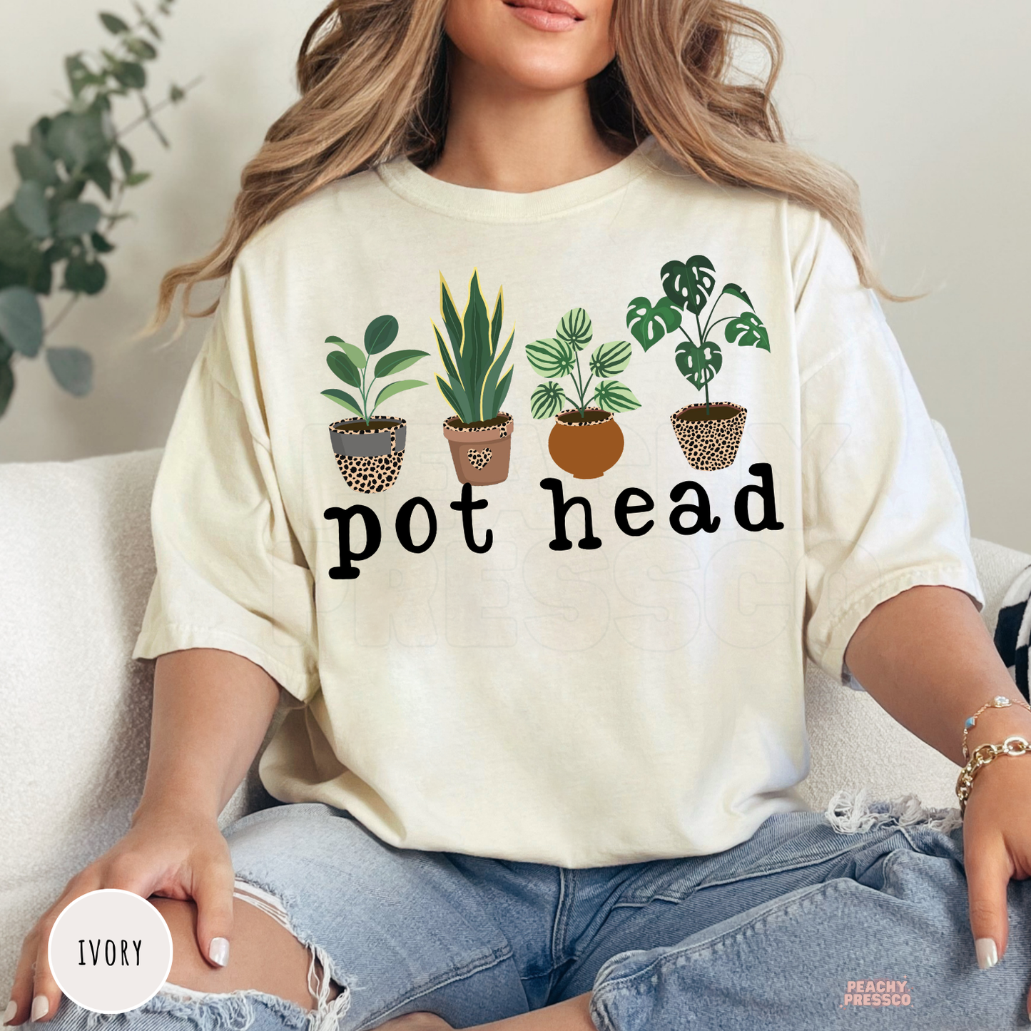 Ivory unisex t-shirt with a humorous "Pot Head" graphic featuring four illustrated houseplants in decorative planters. Funny plant lover shirt for gardeners, plant moms, and indoor plant collectors.