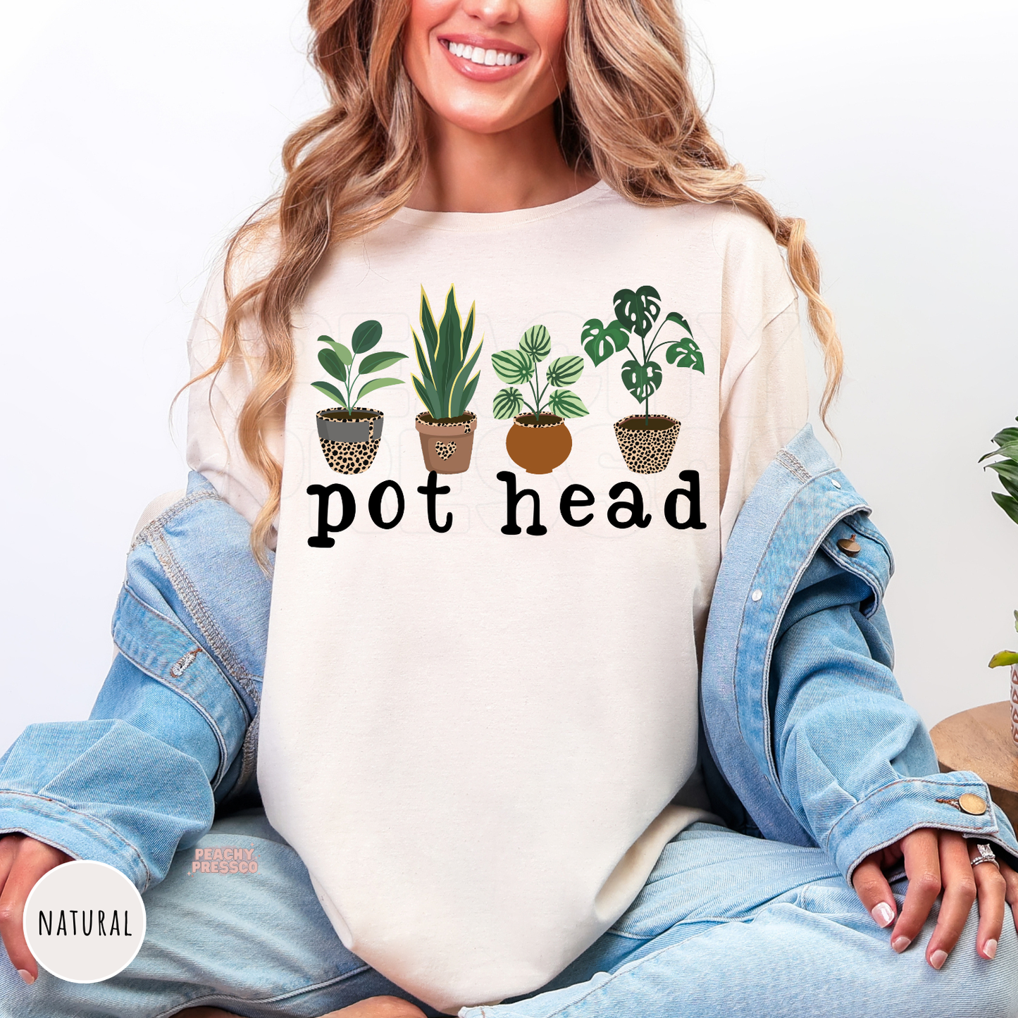 Natural unisex crewneck sweatshirt featuring a funny "Pot Head" graphic with four illustrated houseplants in decorative pots. A cute plant lover sweatshirt perfect for indoor plant enthusiasts, gardeners, and botanical gift giving.