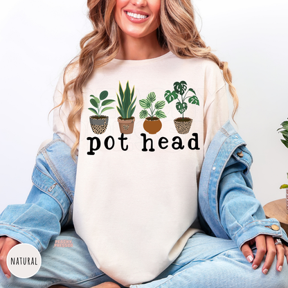 Natural unisex crewneck sweatshirt featuring a funny "Pot Head" graphic with four illustrated houseplants in decorative pots. A cute plant lover sweatshirt perfect for indoor plant enthusiasts, gardeners, and botanical gift giving.