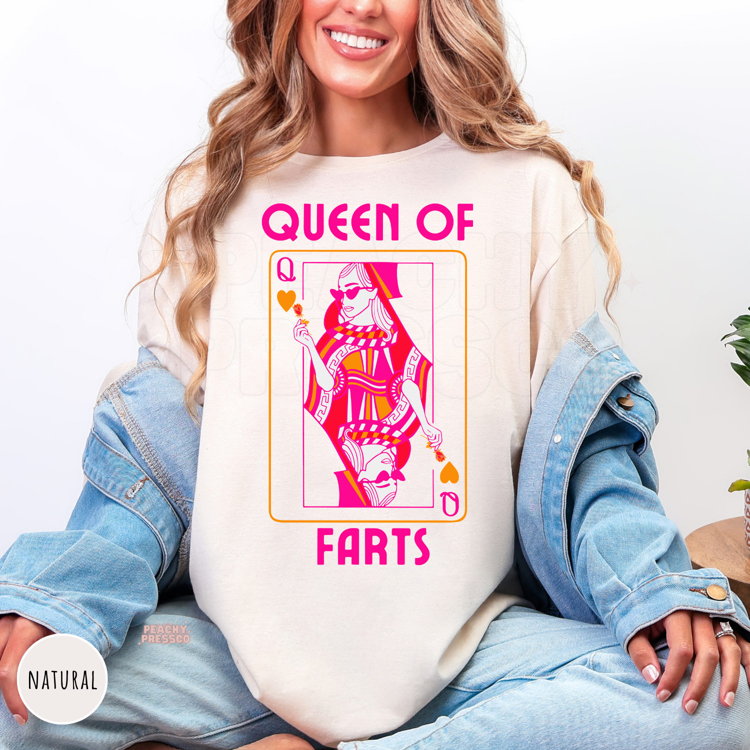 Natural shirt featuring a colorful Queen of Farts playing card graphic, a cozy funny sweatshirt for wives, girlfriends, and couples.