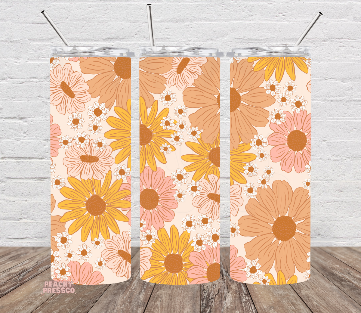 20 oz skinny tumbler featuring a seamless retro floral pattern with daisies and wildflowers in blush, mustard, peach, and cream tones. Includes clear lid and reusable straw.