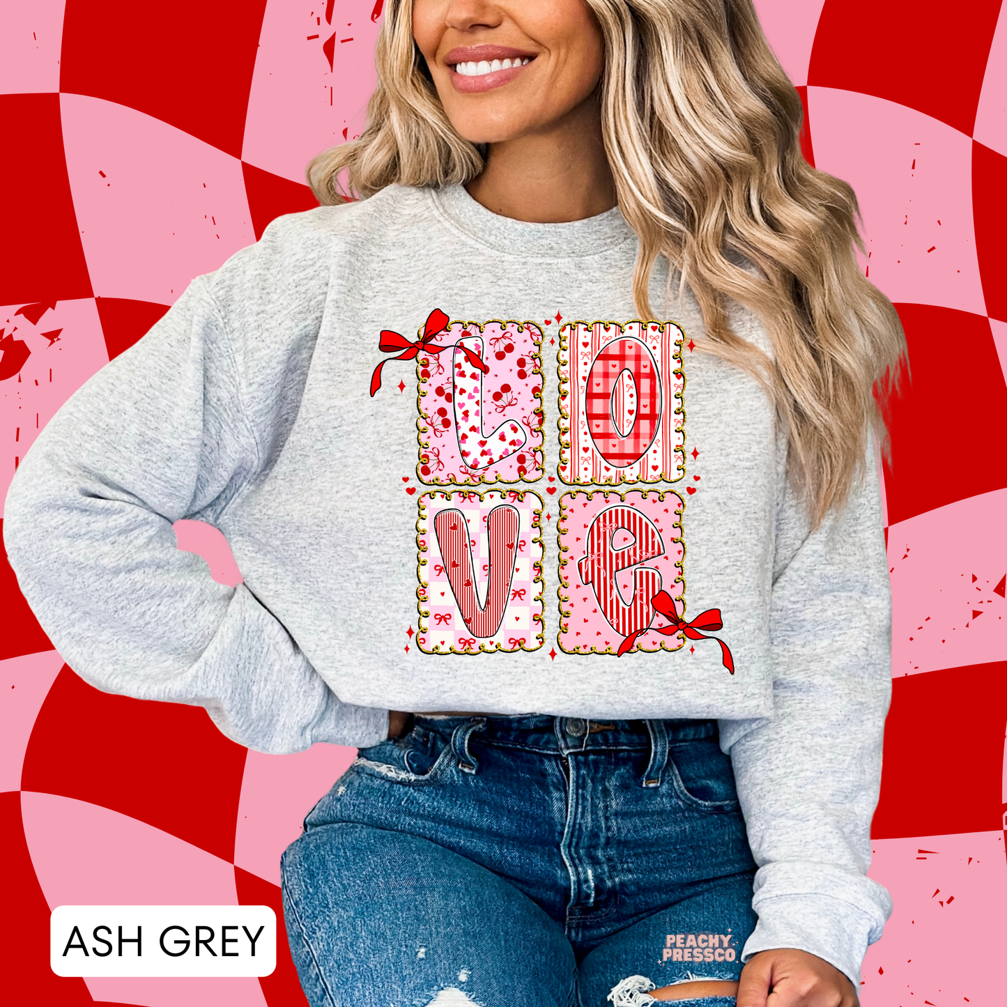 Ash grey sweatshirt displaying a pink patchwork LOVE graphic with bows, hearts, gingham details, and a trendy coquette Valentine's aesthetic.