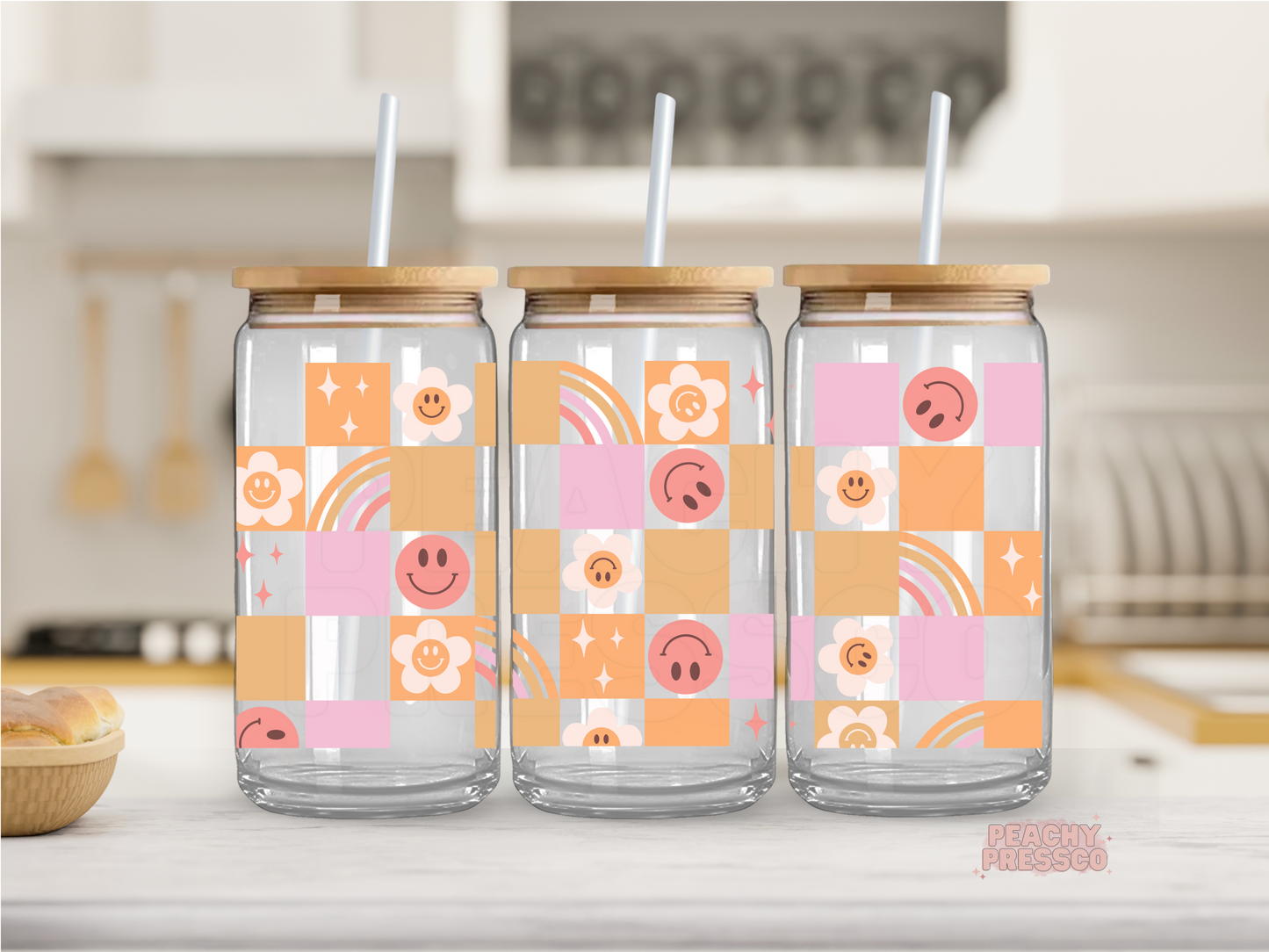 16 oz glass can featuring a retro patchwork design with smiley faces, flowers, rainbows, and sparkles in soft pastel colors.