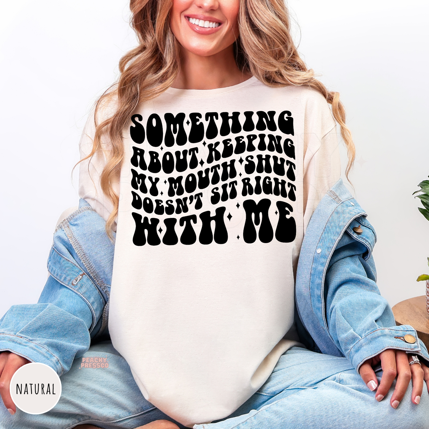 Natural shirt featuring the funny sarcastic quote "Something About Keeping My Mouth Shut Doesn't Sit Right With Me" in vintage-style black lettering.