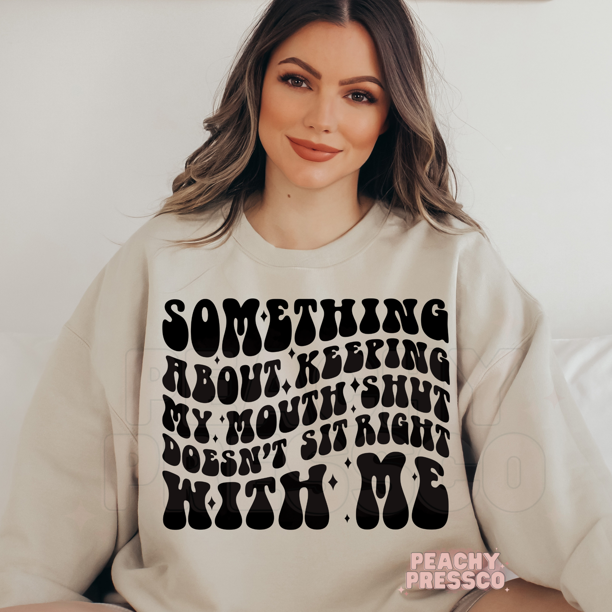 Sand beige sweatshirt with the funny sarcastic "Something About Keeping My Mouth Shut Doesn't Sit Right With Me" quote in oversized retro black lettering.