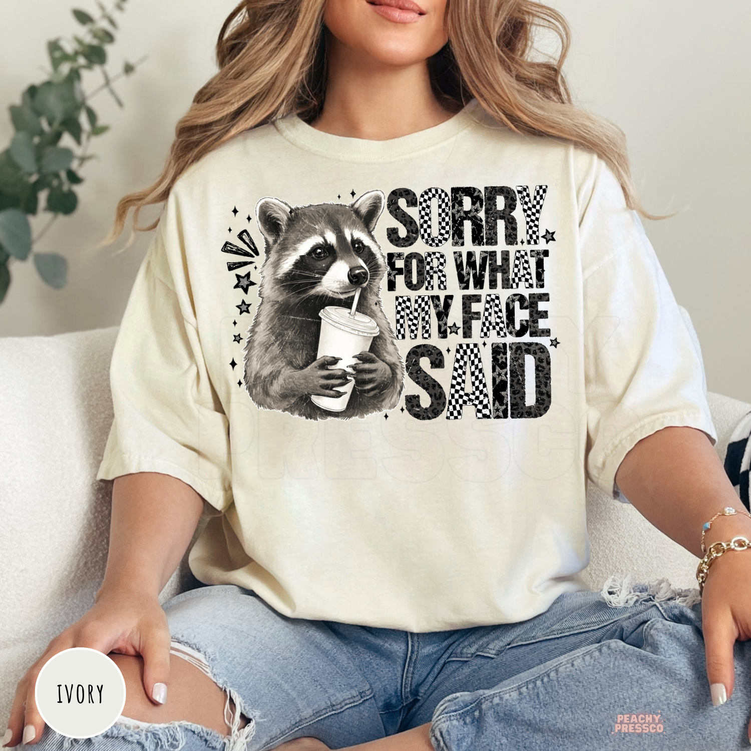 Funny "Sorry For What My Face Said" Comfort Colors t-shirt in Ivory with a vintage raccoon graphic and sarcastic saying, relaxed unisex fit.