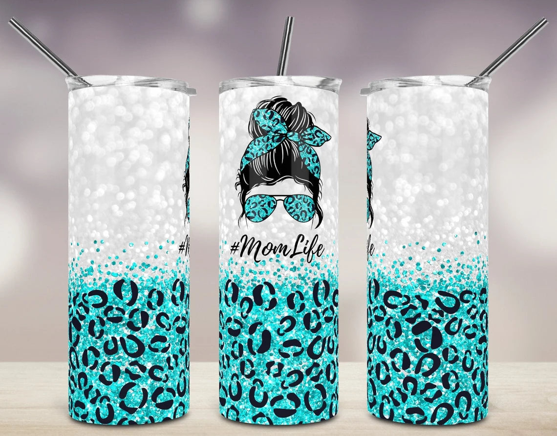 20oz skinny tumbler featuring teal glitter leopard print with a Mom Life graphic, messy bun hairstyle, teal sunglasses, and matching bandana.