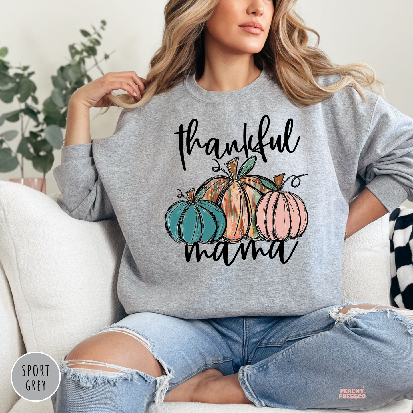 Sport grey crewneck sweatshirt featuring a "Thankful Mama" design with colorful pumpkins, stylish fall clothing for moms.