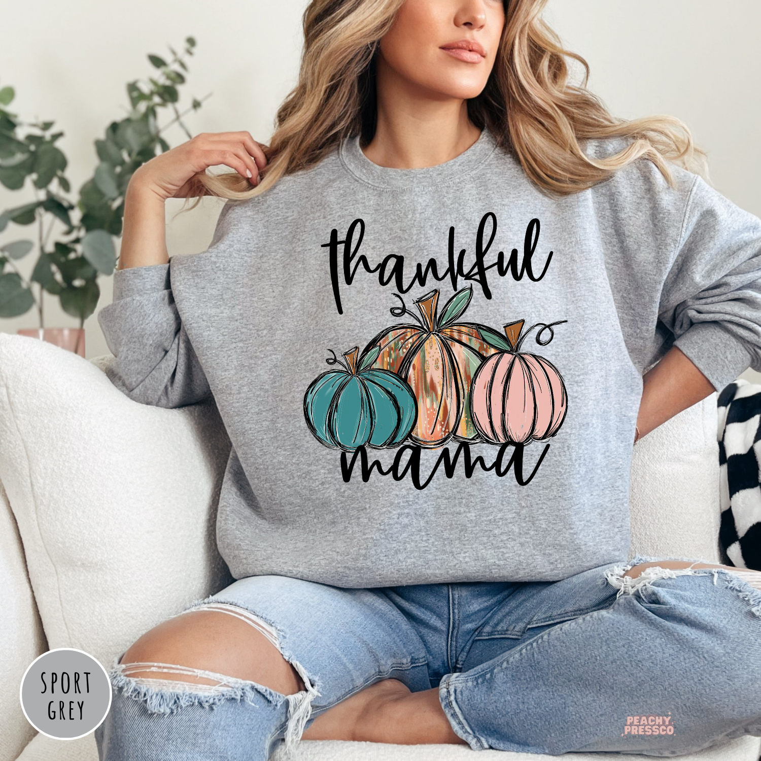 Sport grey crewneck sweatshirt featuring a "Thankful Mama" design with colorful pumpkins, stylish fall clothing for moms.