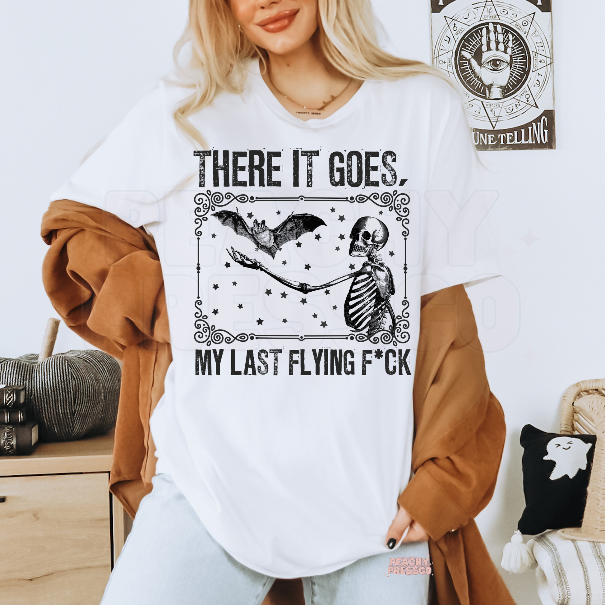 White There It Goes Halloween shirt featuring a vintage skeleton and flying bat graphic with spooky stars