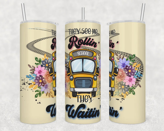 20oz skinny tumbler featuring a floral school bus with the funny "They See Me Rollin'" teacher design.