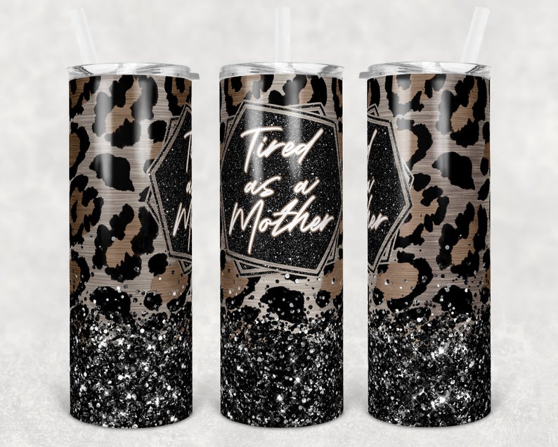 20oz skinny tumbler featuring black glitter leopard print and the phrase Tired as a Mother.
